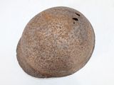 a large rock that is sitting on a white surface