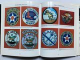 a book with a picture of military patches on it