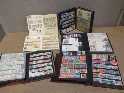 many different types of stamps on a table