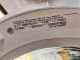 a close up of a washing machine with a label on it