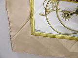 a picture of a square scarf with a picture of a clock on it