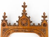 a wooden frame with a clock on top of it