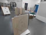 an image of a room that has a lot of boxes on the floor