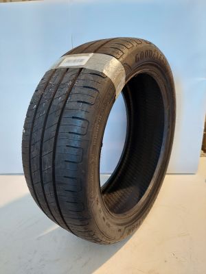 a close up of a tire on a white surface