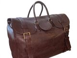 brown leather duffel bag on white background with clipping for text
