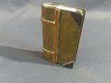 a small book that is sitting on a table