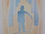 la photo d'un homme en costume et chapeau, muni d'une canne