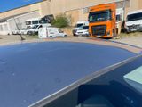 a truck that is parked next to a building