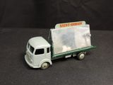 a small toy truck with a sign on the back of it