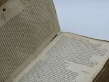 an open book that is sitting on top of a table