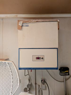 an image of a room with a fan and a fan on the wall