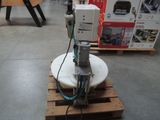 a machine that is sitting on a pallet in a store
