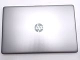 a laptop that is sitting on a white table