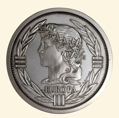 an image of a close up of a coin with a woman on it