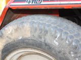 a close up view of a tire on a tractor