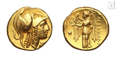 a gold coin with an image of a woman and a man on it