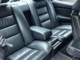 a picture of a car with black leather seats in the back