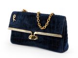 blue velvet handbag with gold chain strap and clasp