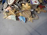 a pile of assorted items sitting on the floor