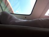 a person sitting in the back seat of an airplane