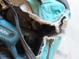 a blue tool bag with tools inside of it