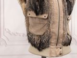 a mannequin with a fur vest on it