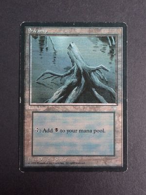 a close up of a card with a picture of a tree