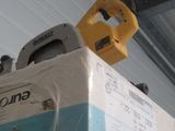 boxes are stacked on top of each other in a garage