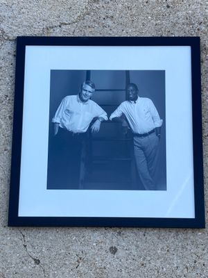 a picture of two men standing next to each other
