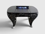 a black coffee table with a glass top on a white background