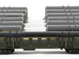 four train cars that are sitting next to each other