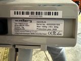 a label on the back of a parking meter
