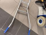 many tools that are laying on the floor next to a toilet