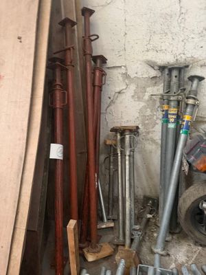 a pile of pipes and pipes in a room