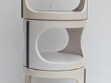 three shelves that are stacked on top of each other
