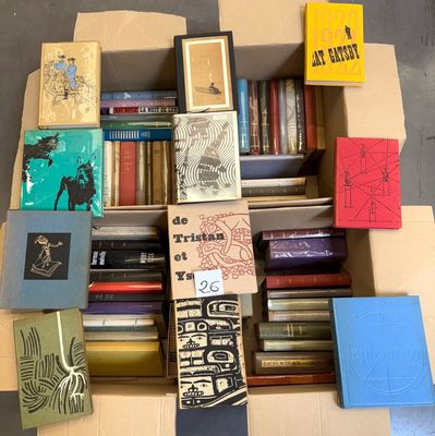 a box full of books that are sitting on the floor