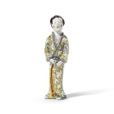 une image représentant une figurine d'une femme vêtue d'un kimono