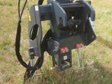 an image of a machine that is sitting in the grass