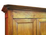 an image of a wooden cabinet with two doors