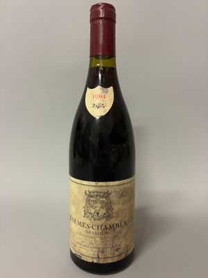 a bottle of wine that is sitting on a table