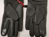 two pairs of black gloves with a red cord and a tag