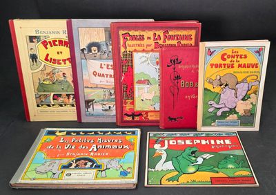 Plusieurs livres pour enfants sont alignés sur une surface noire