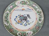 a plate with a picture of a bird on it
