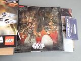 a box of lego star wars books on the table
