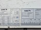 a picture of a white refrigerator with a bunch of labels on it