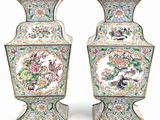 pair of chinese vases with birds and flowers painted on them