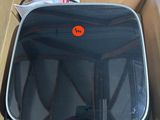 a suitcase that is sitting in a box on the floor