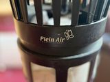 a close up of a blender with a bunch of brushes in it