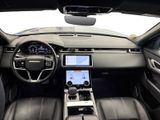 a view of the interior of a car from the driver ' s seat