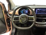 the interior of a car with a steering wheel and dashboard controls
